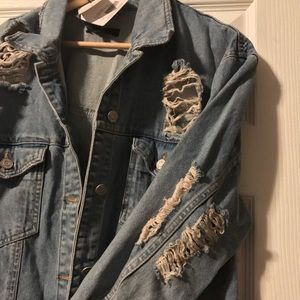 Distressed denim jacket